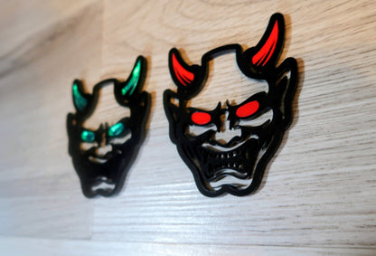 Oni Mask Badge. Includes 2