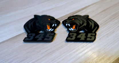 Aggresive Tiger badges. Includes 2.