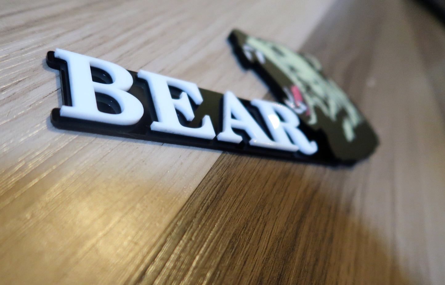 Grizzly Bear badges. Includes 1