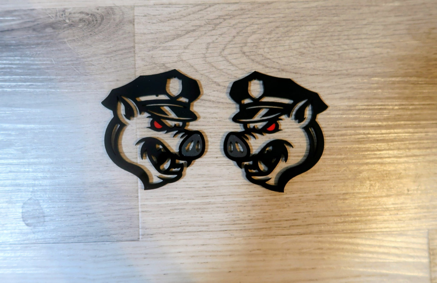 Pig fender badges. Includes 2