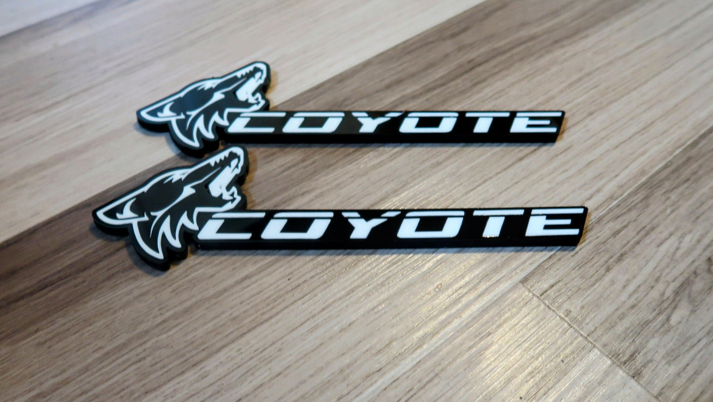 Coyote badges. Includes 2.