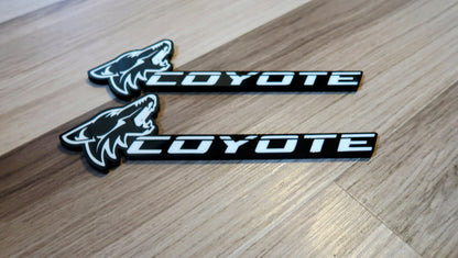 Coyote badges. Includes 2.