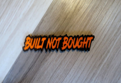 Built not bought car badge