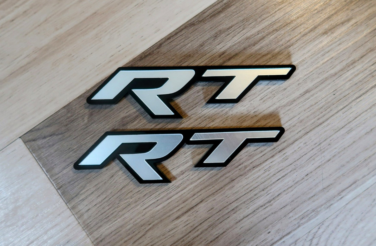 Racetrack badges. Includes 2.