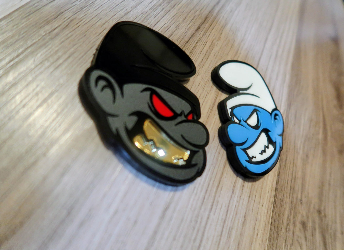 Possessed Smurf badges. Includes 2