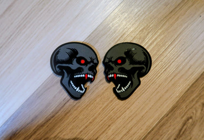 Vampire Skull badges. Includes 2.