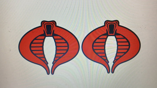 G.I. Joe Cobra badges. Includes 2