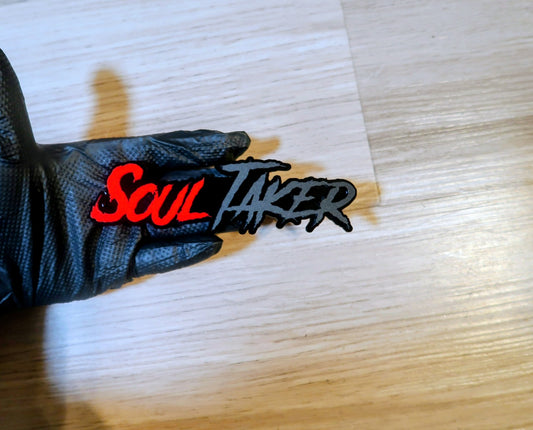 Soul Taker badge. Includes 1