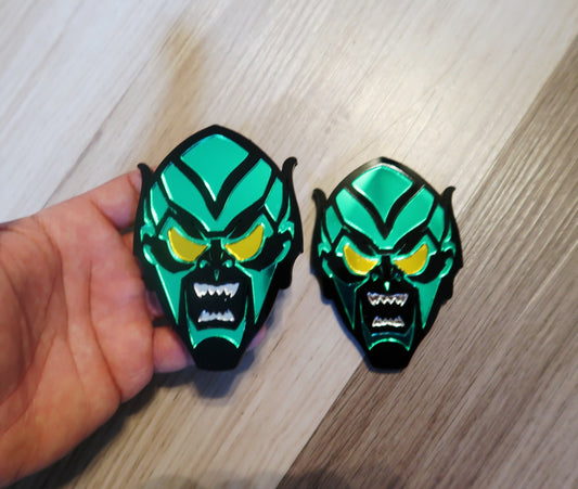 Inspired Green Goblin badges. Includes 2.