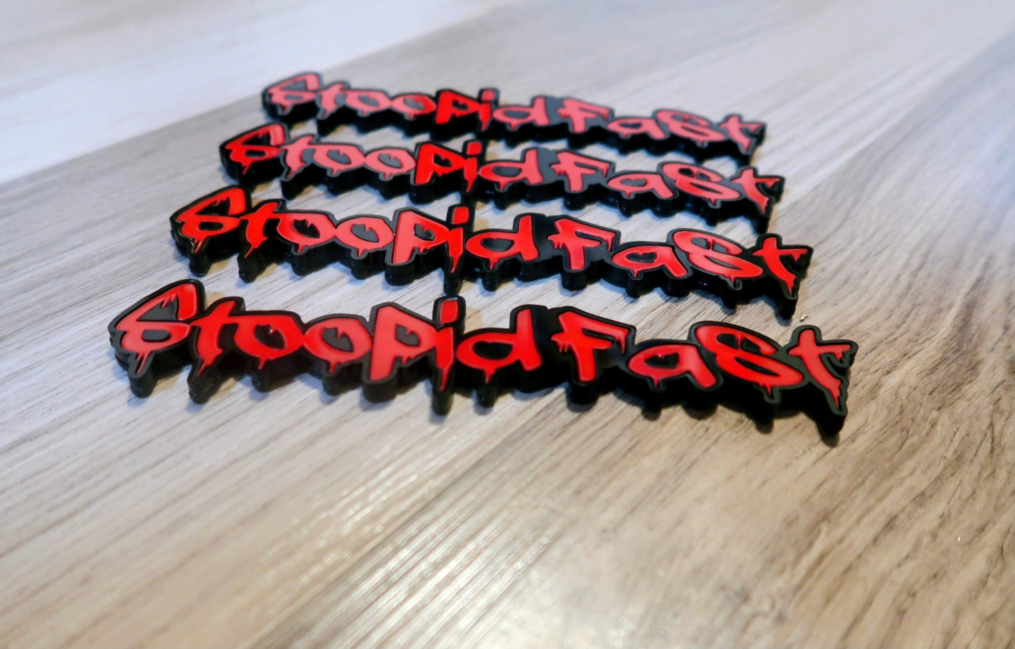 Stoopid Fast badges. Includes 2