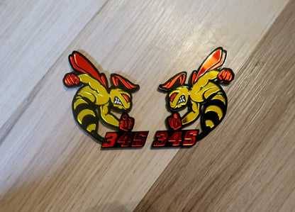 392 or 345 fender badges. Includes 2.