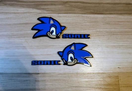 Sonic head and text badge. Includes all 4.