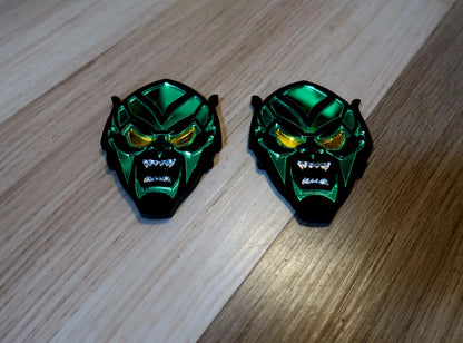 Inspired Green Goblin badges. Includes 2.