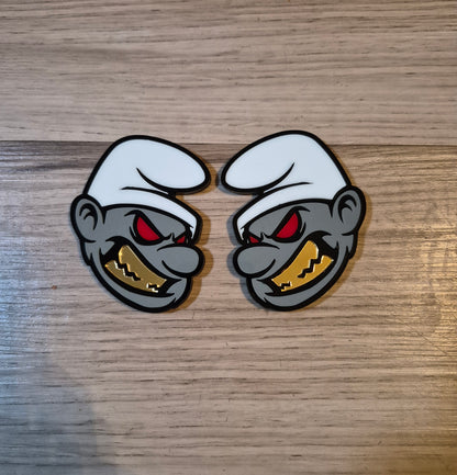 Possessed Smurf badges. Includes 2
