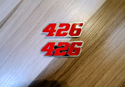 392, or 345, or 426 fender badges. Includes 2.