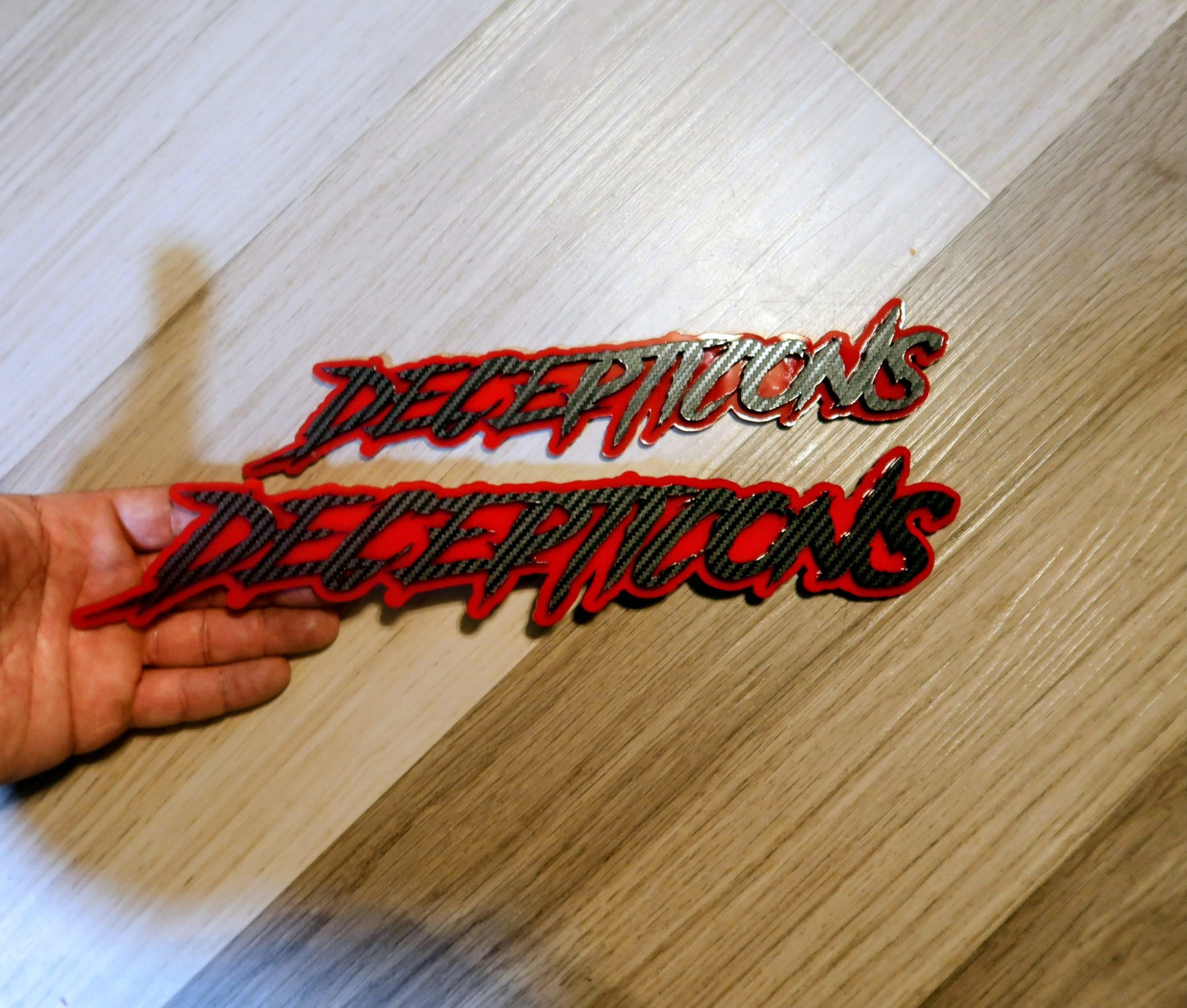 Decepticons text badge. Includes 1.