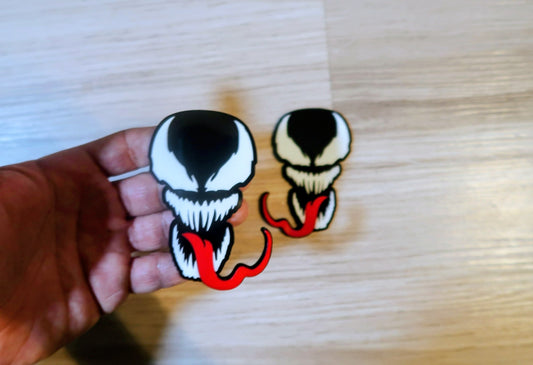 Venom with Tongue badges. Includes 2