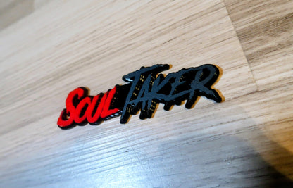Soul Taker badge. Includes 1
