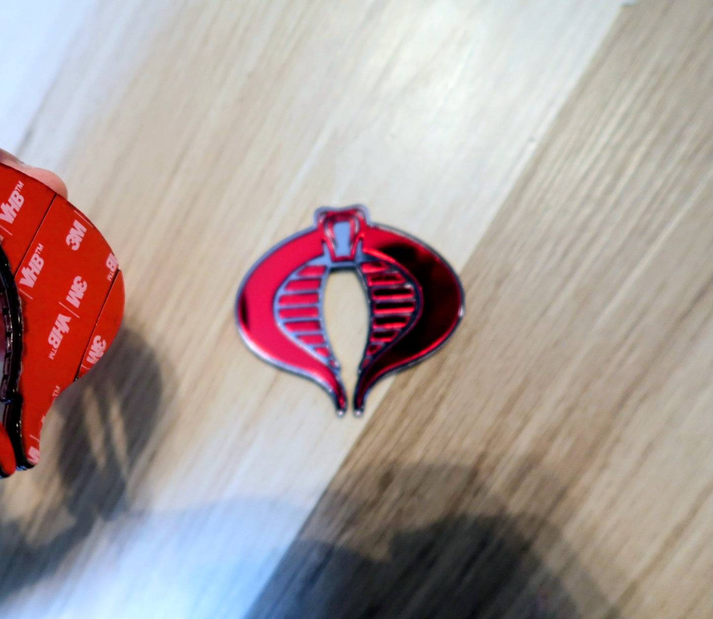 G.I. Joe Cobra badges. Includes 2