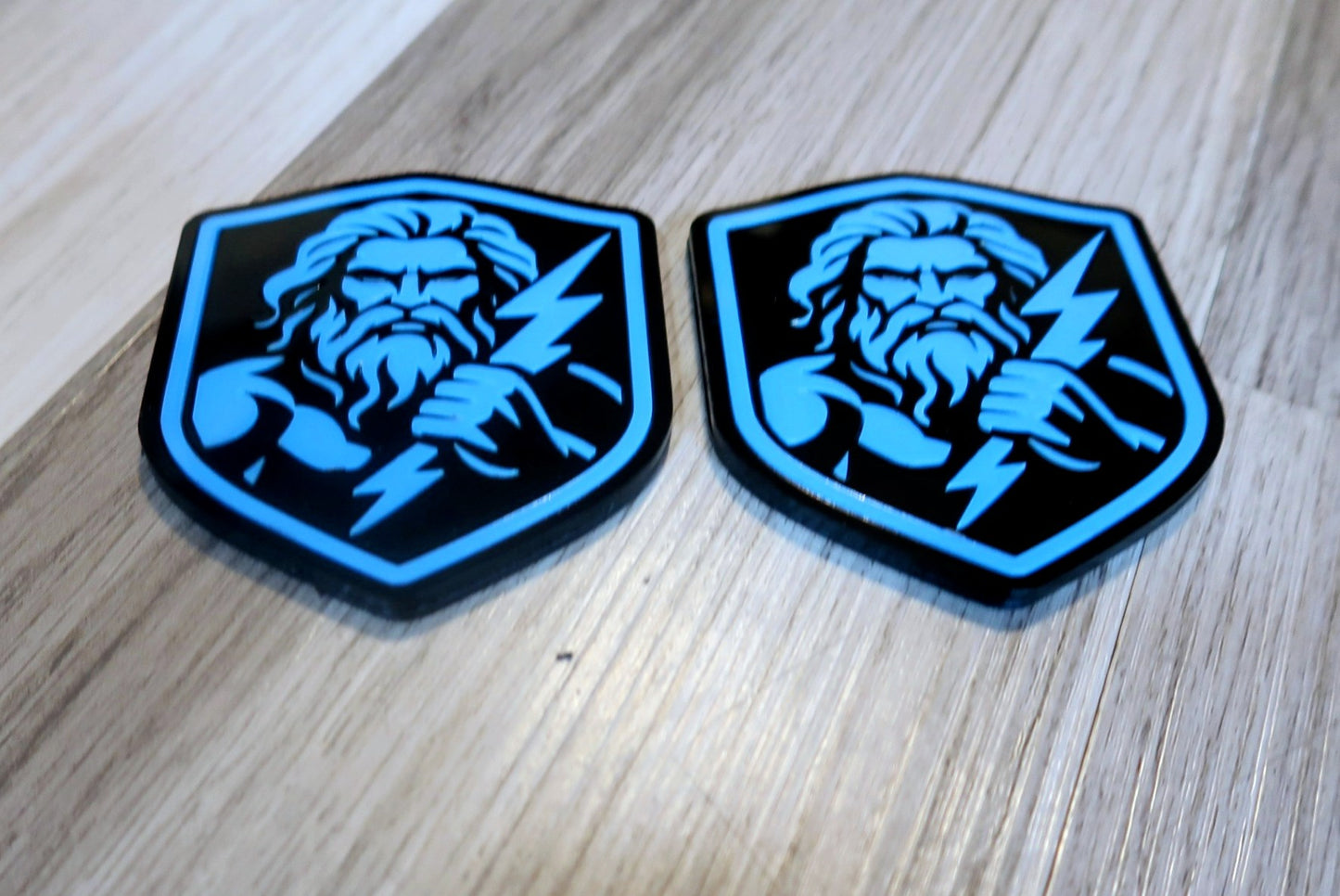 Zeus badges. Includes 2