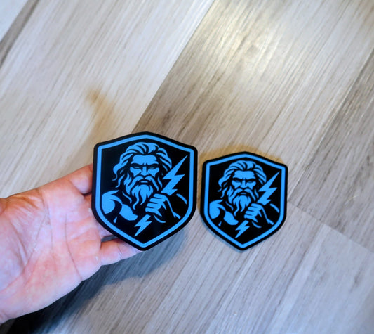 Zeus badges. Includes 2