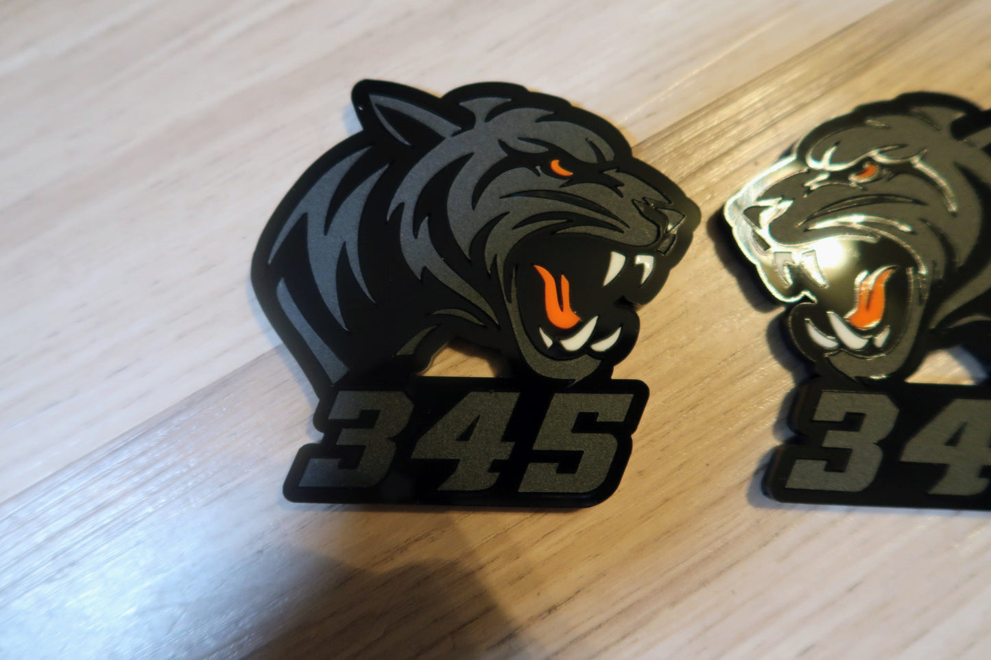 Aggresive Tiger badges. Includes 2.