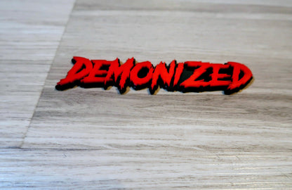 Demonized Car Badge